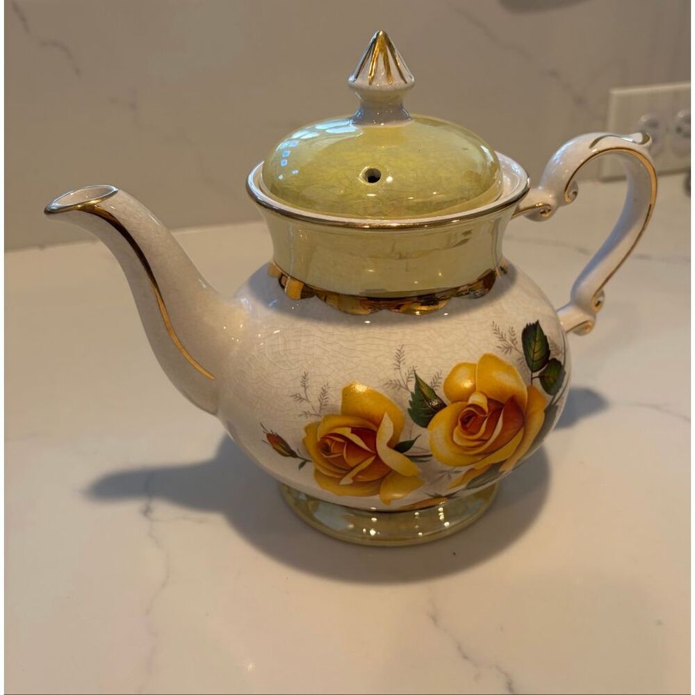 Vintage Gibson Staffordshire England Teapot featuring yellow roses and gold trim